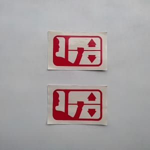deux autocollant symboles ouveture fenetre automobile